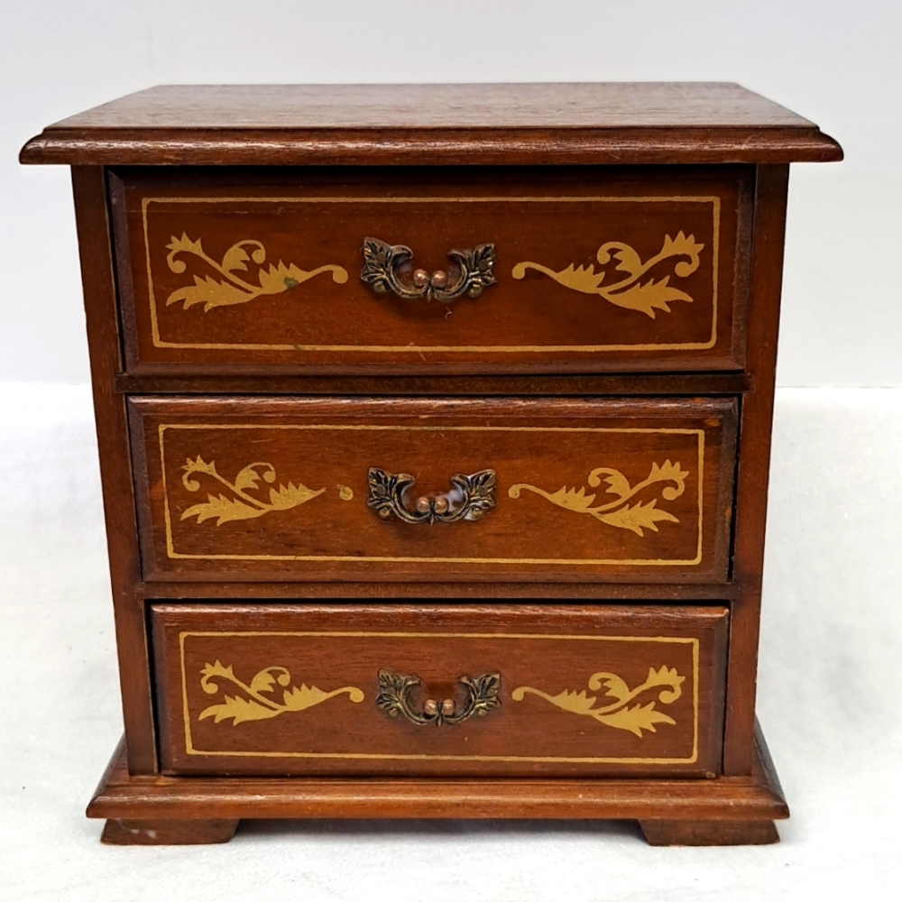 - Vintage 3 drawer wood armoire style jewelry box with metal pull handles